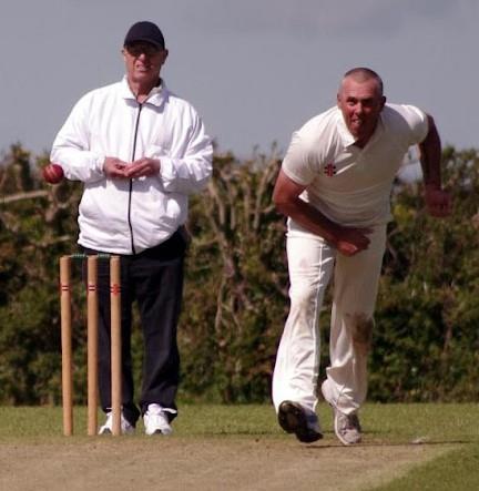 Danny racing in to bowl